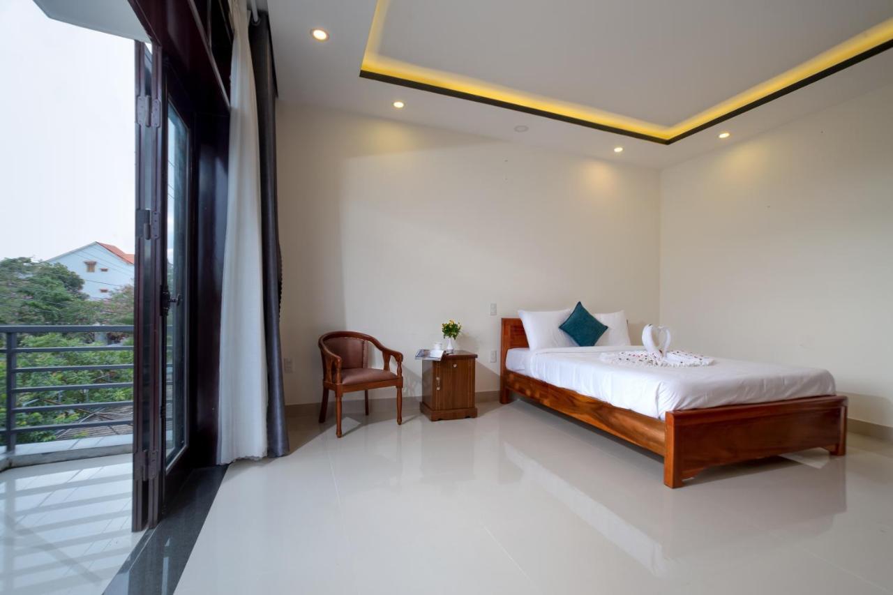 Sum Villa Hoi An An Bàn Extérieur photo